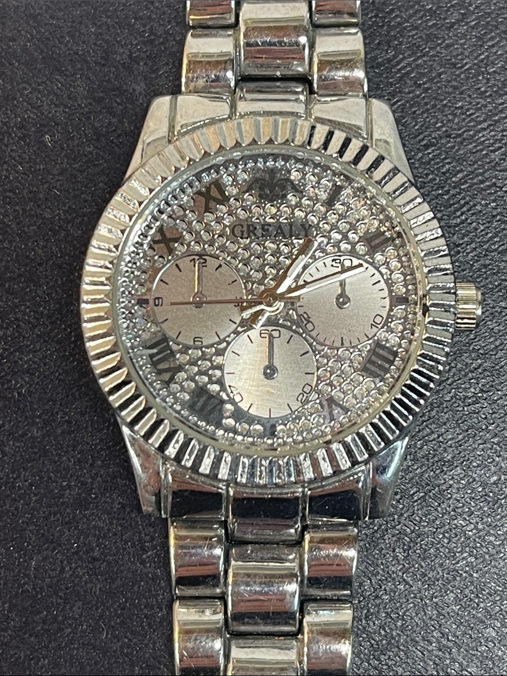 Ladies IReal silver watch needs battery similar to Michael Kors